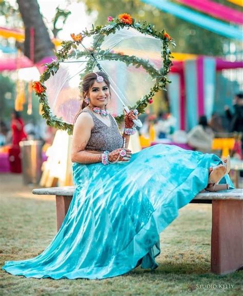 bride with umbrella|More.